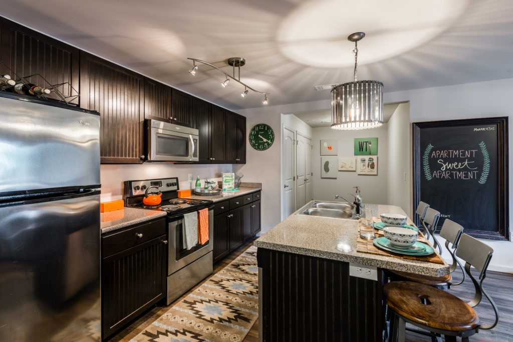 Kitchen with island seating at Monarch 301