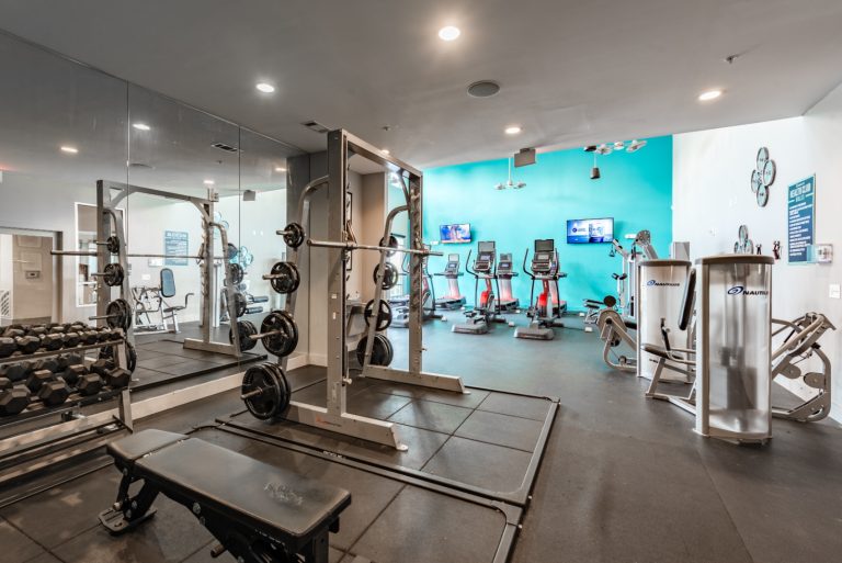 apartment fitness center with exercise equipment